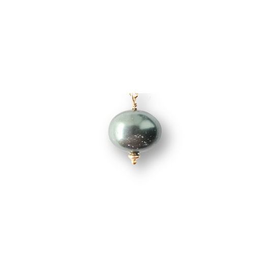 Gold and pearl charm